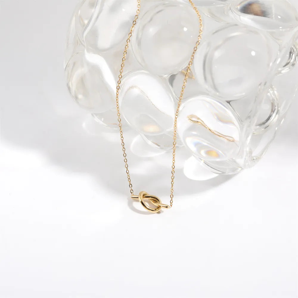 Golden Knot Pendant Necklace